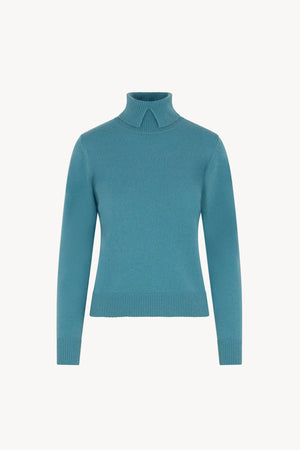 Dolcevita con Spacchetto in Puro Cashmere Turchese